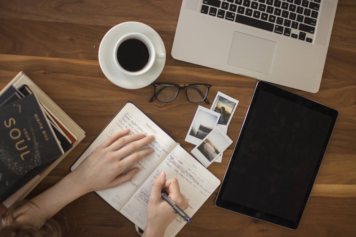 Marketing coordinator working at desk with laptop